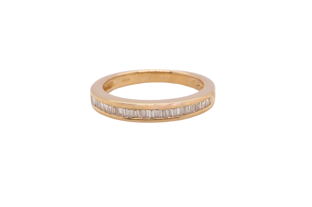 An 18ct gold baguette diamond eternity ring
