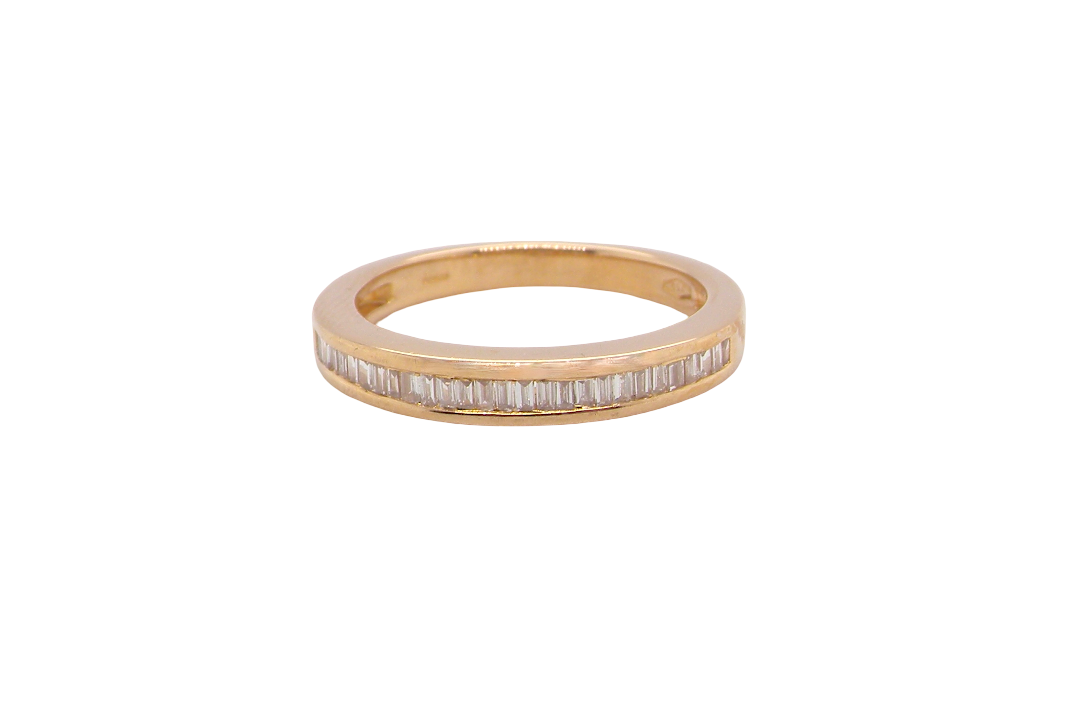 An 18ct gold baguette diamond eternity ring
