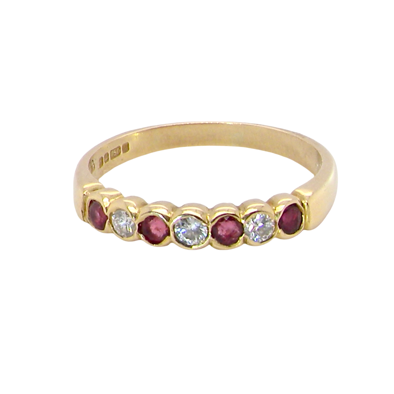 Yellow gold ruby and diamond half hoop ring