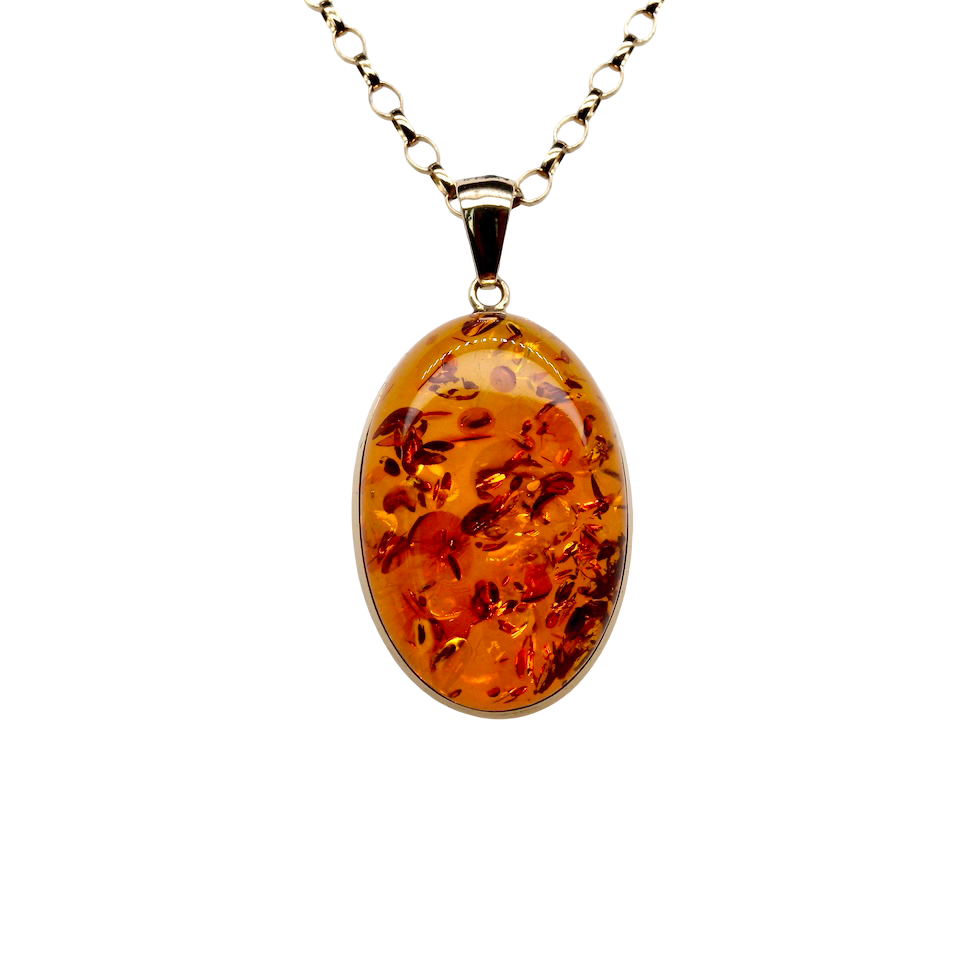 Amber pendant necklace on a white background