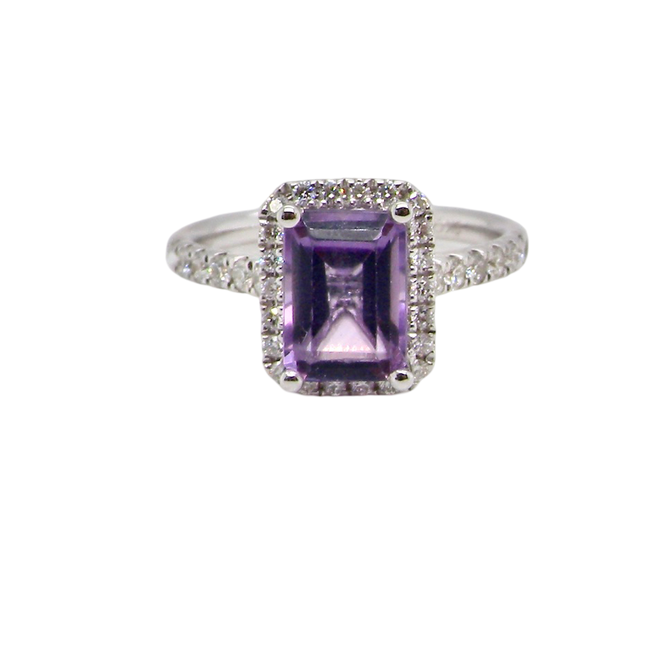 An Amethyst and Diamond rectangular cluster ring