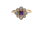 An Amethyst and Opal dress ring