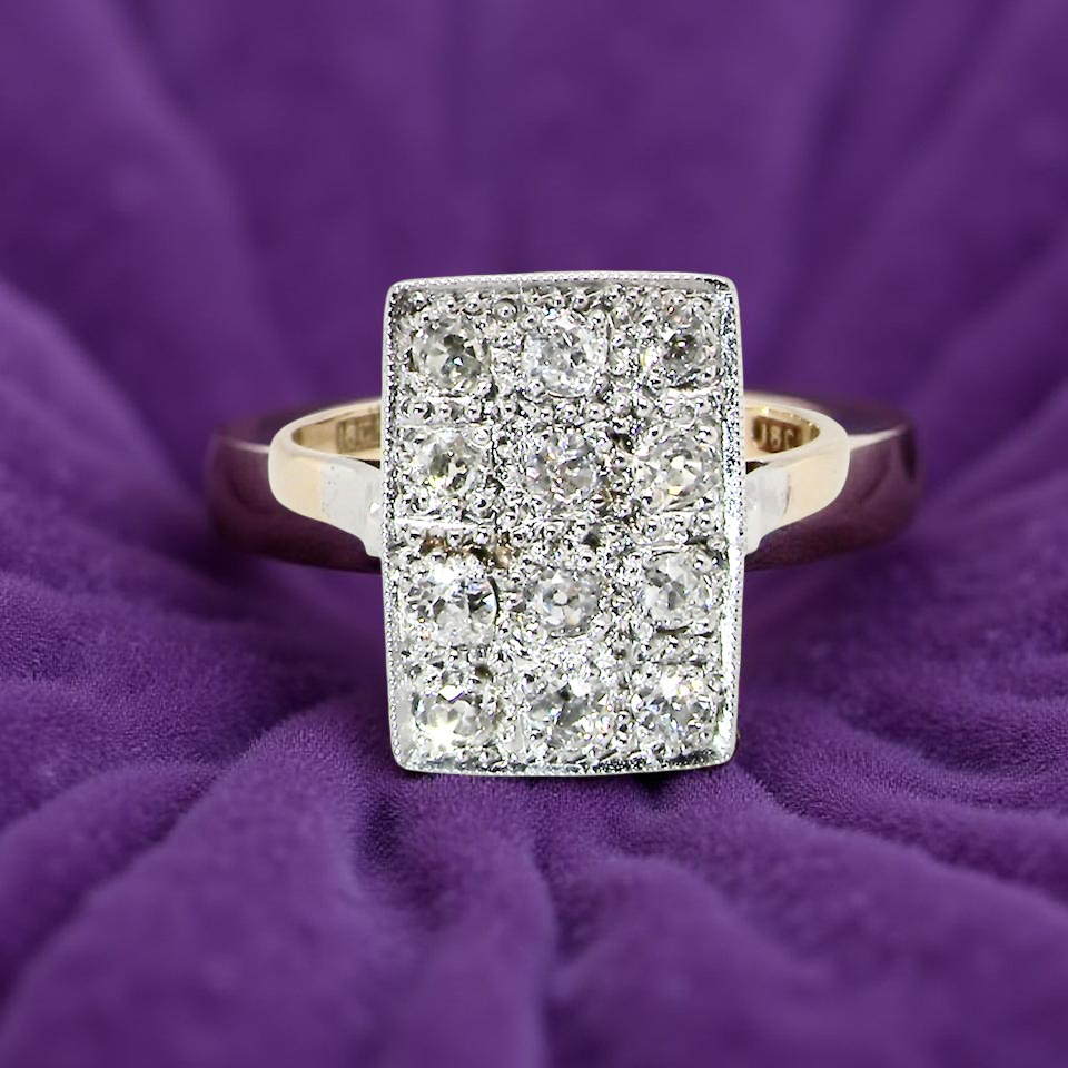 An Art Deco Diamond panel ring