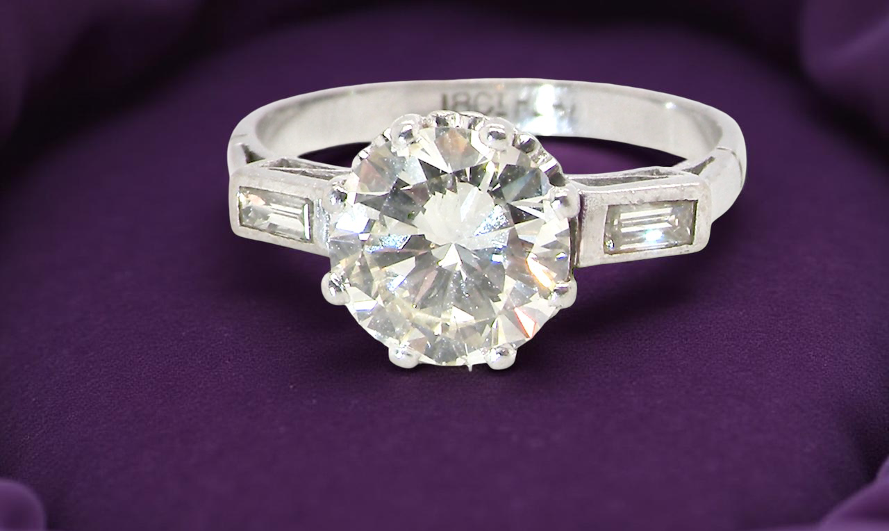 An Art Deco solitaire ring beautiful 1.75 carat diamond