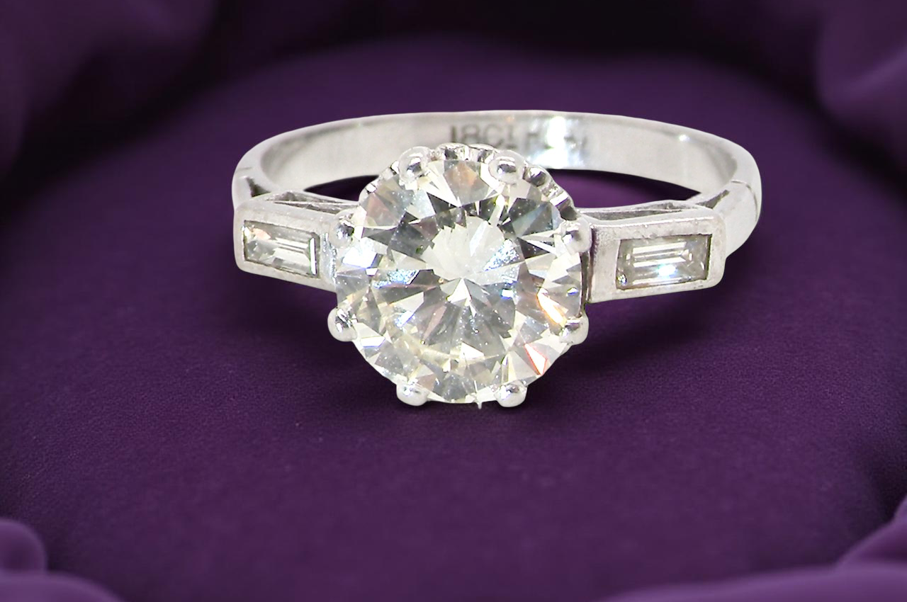 An Art Deco solitaire ring beautiful 1.75 carat diamond