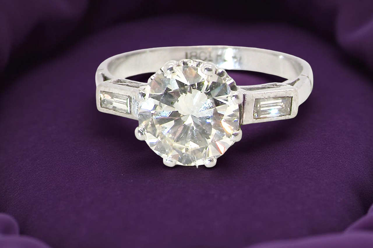 An Art Deco solitaire ring beautiful 1.75 carat diamond