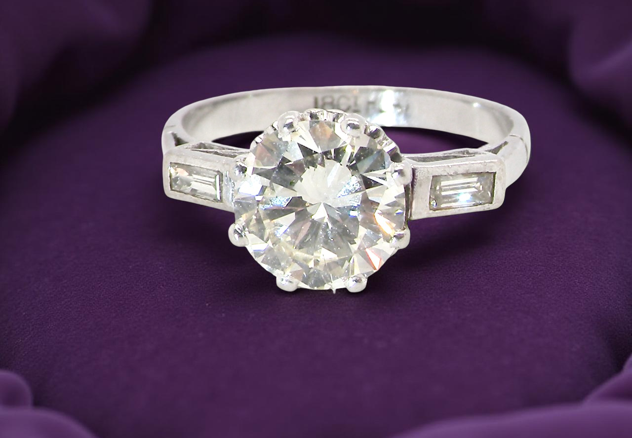 An Art Deco solitaire ring beautiful 1.75 carat diamond