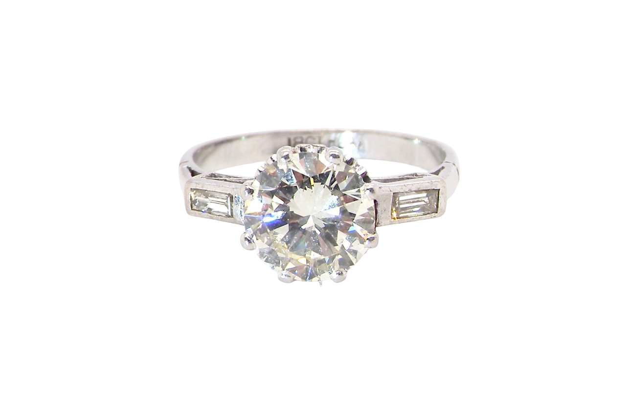 An Art Deco solitaire ring showcasing a 1.75 carat diamond