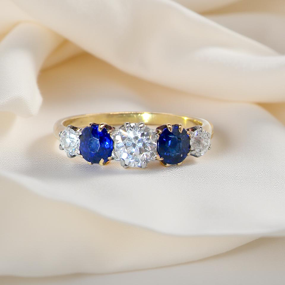 An Early 20th Century 5 Stone Diamond and Sapphire Ring