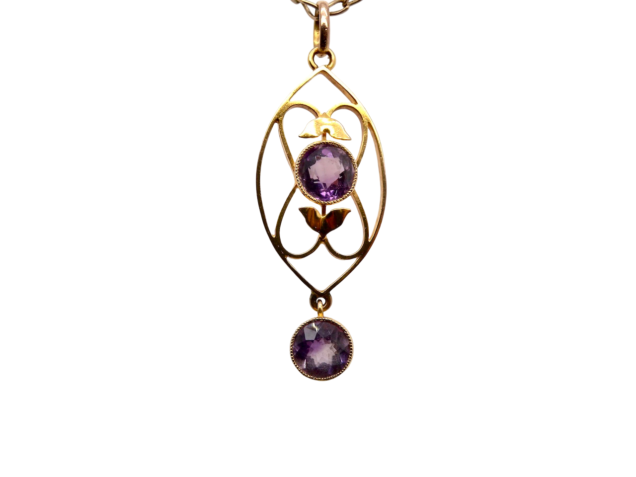 An Edwardian pendant set with two amethyst