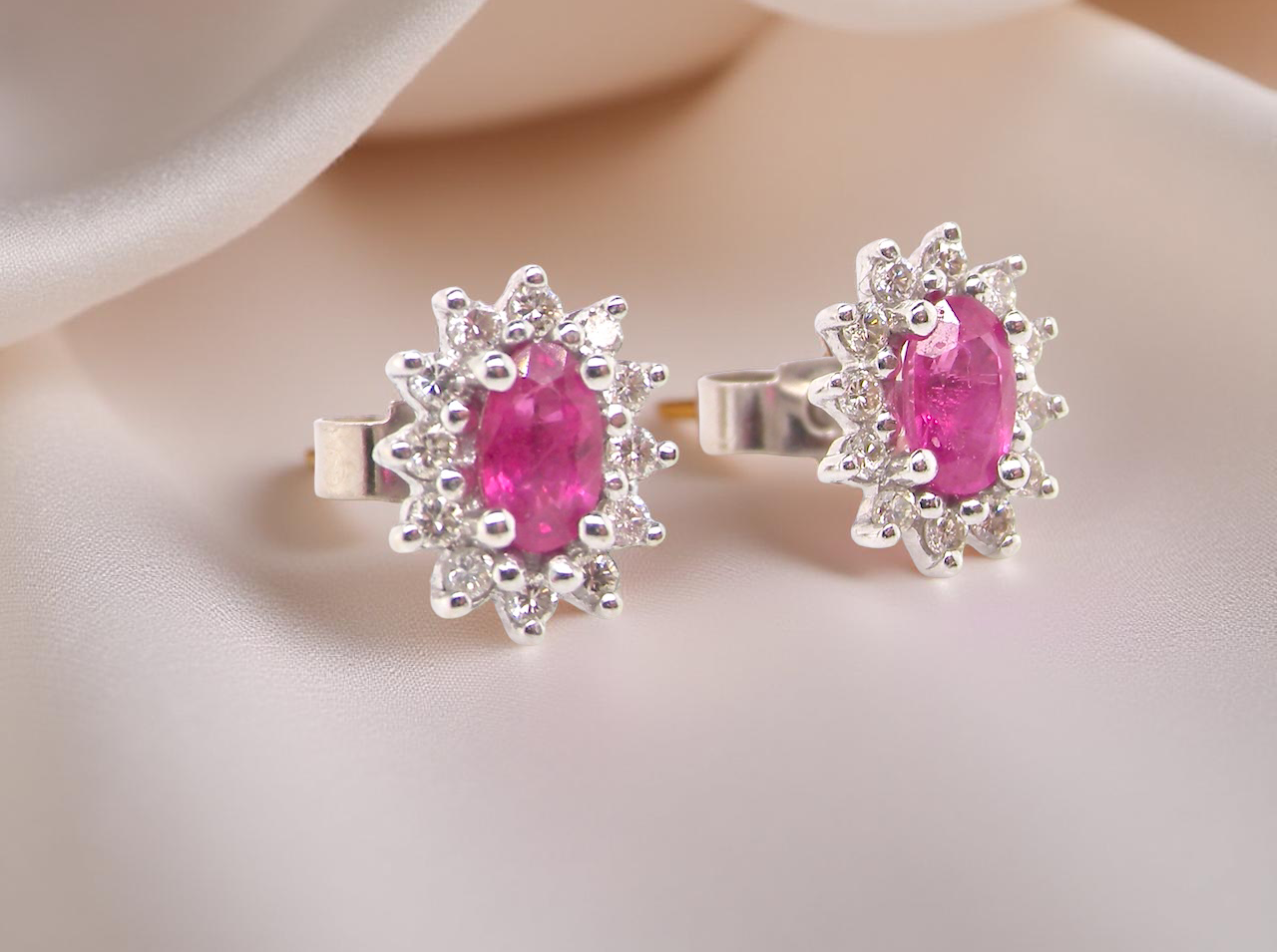 An Elegant Pair of Ruby & Diamond Cluster Earrings