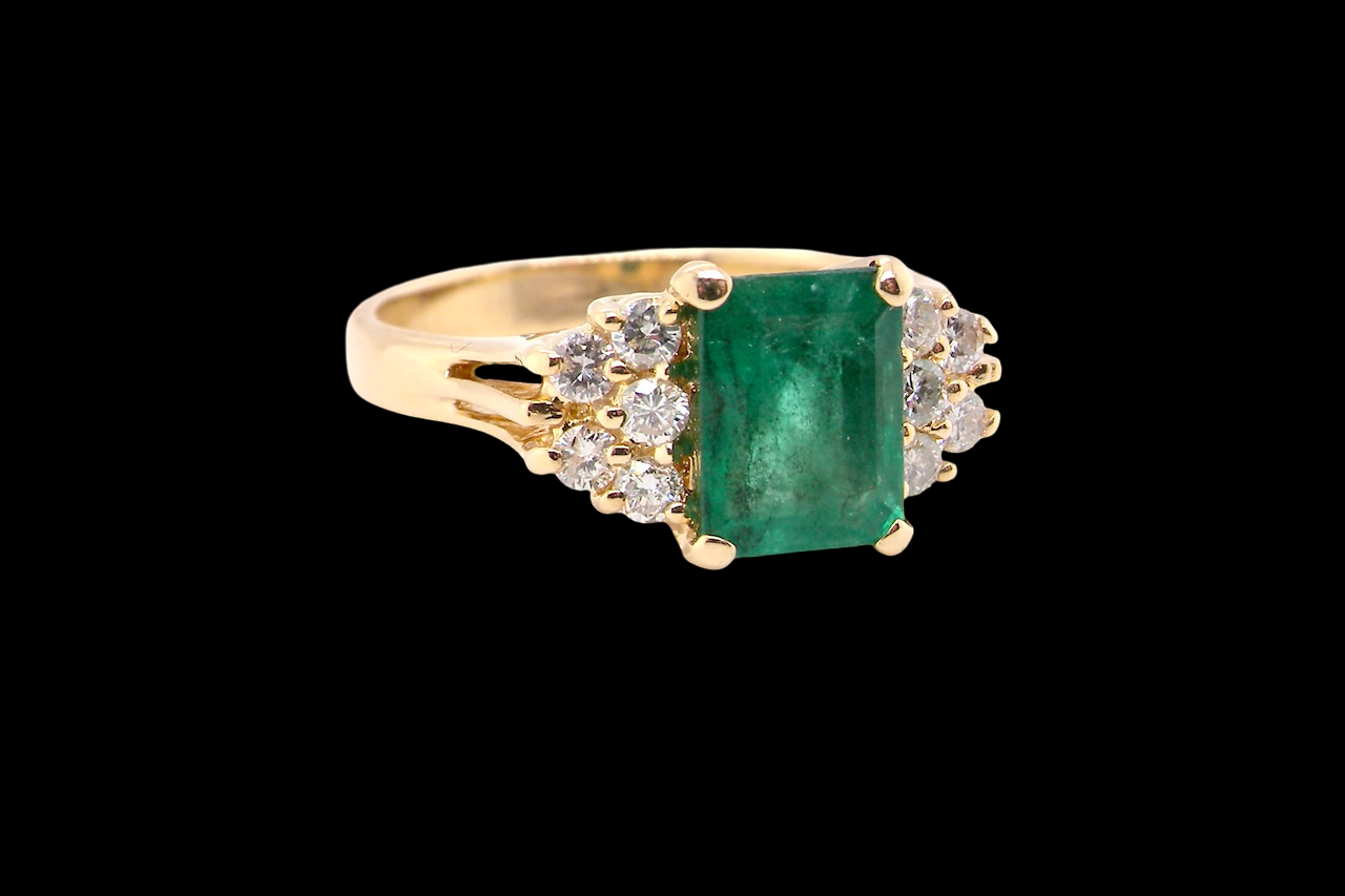 An Emerald & Diamond 18ct Gold Ring