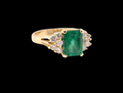 An Emerald & Diamond 18ct Gold Ring
