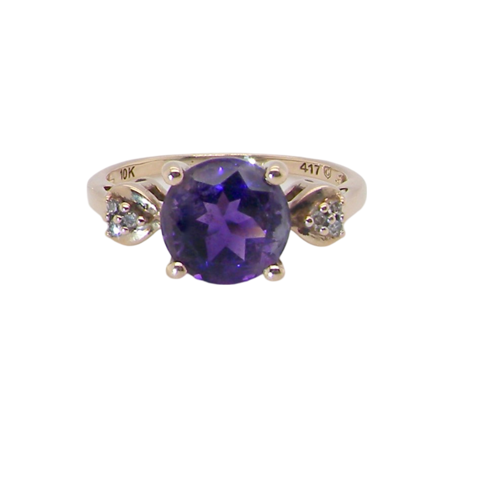 An amethyst and diamond dress ring