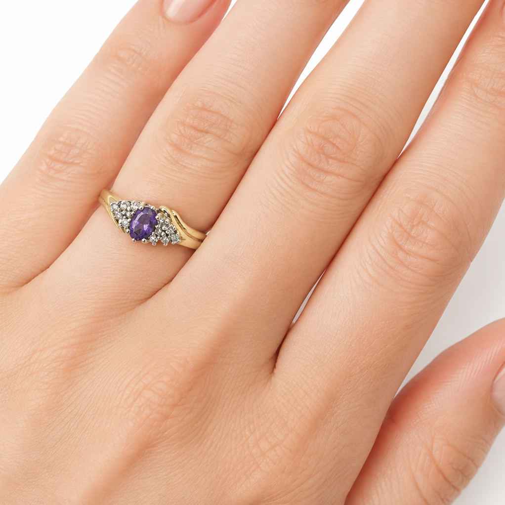 Marquise amethyst and diamond ring on a hand