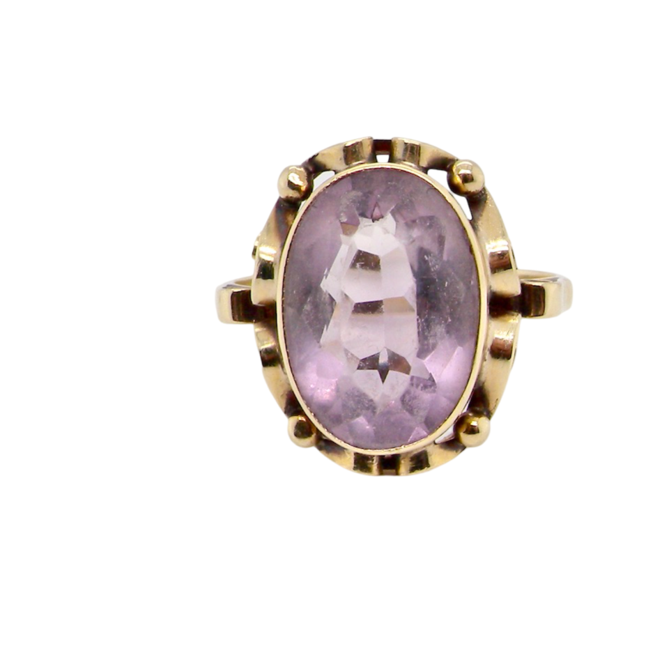 An amethyst dress ring