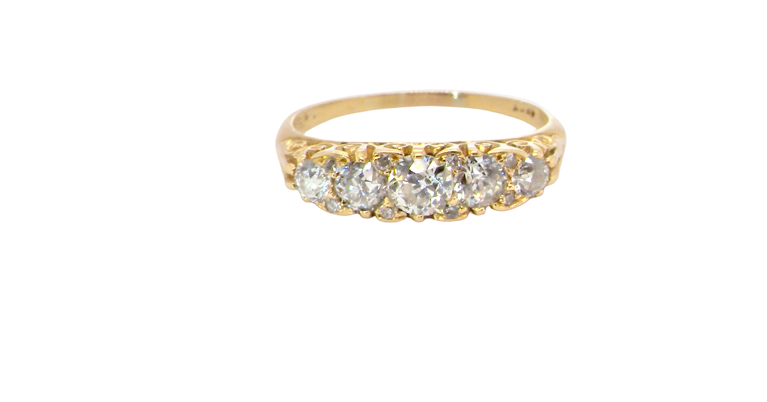 An antique boat shaped five stone ring. Set with five old cut white diamonds. Centre 5mm (0.45-0.50 carats) each side a 4mm stone, at each end a 2.4mm stone. Total diamond content estimated at one carat.