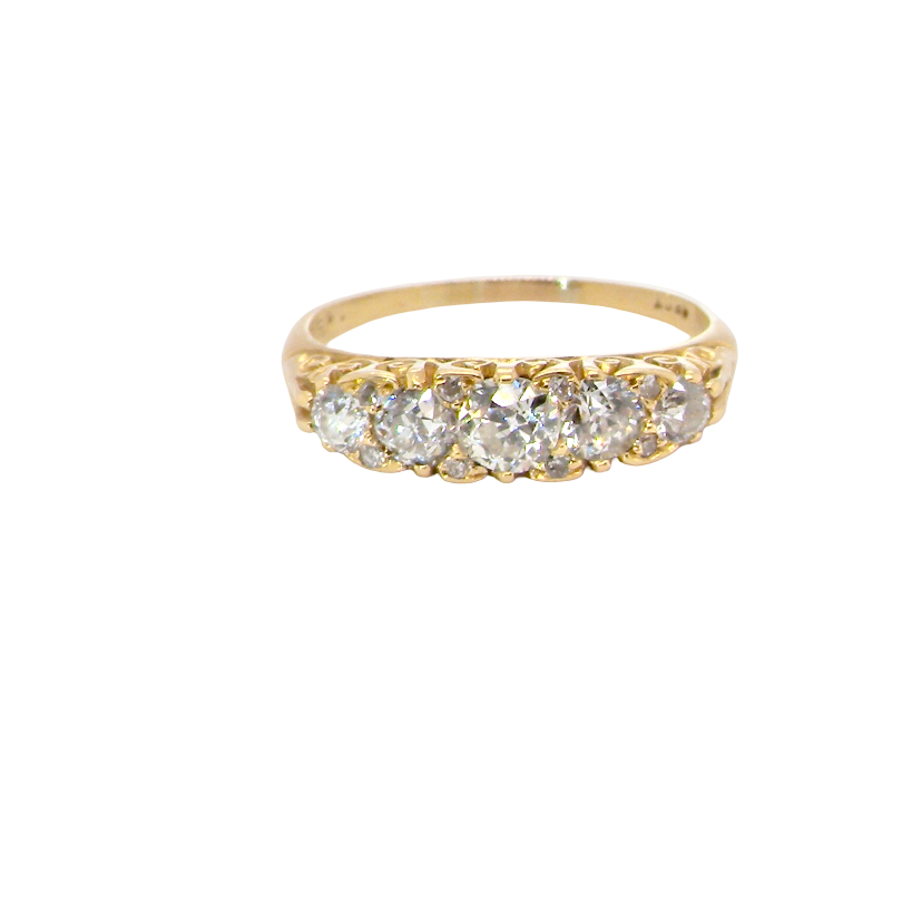 An antique boat shaped five stone ring. Set with five old cut white diamonds. Centre 5mm (0.45-0.50 carats) each side a 4mm stone, at each end a 2.4mm stone. Total diamond content estimated at one carat.