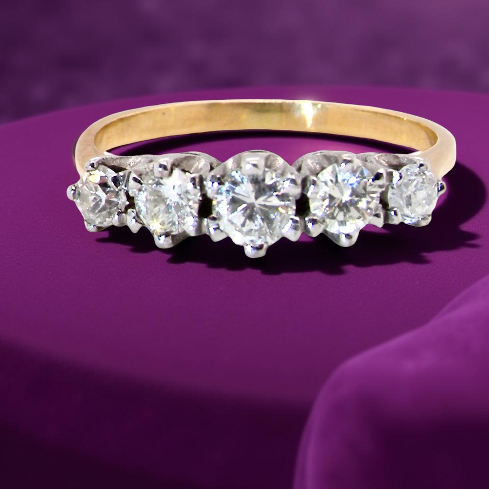 An antique five-stone ring from the early 20th century,