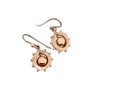 An antique pair of gold drop earrings