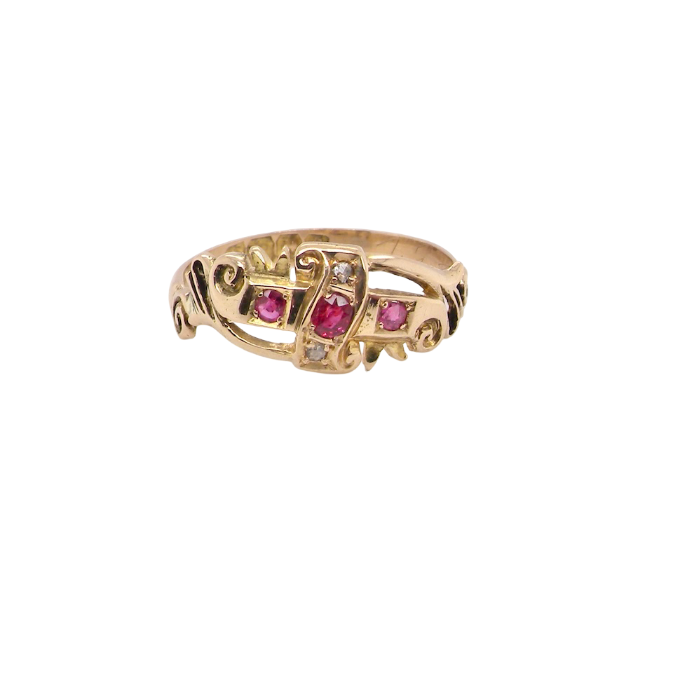 An early 20th century ring. 18 carat gold, set with three rubies. 