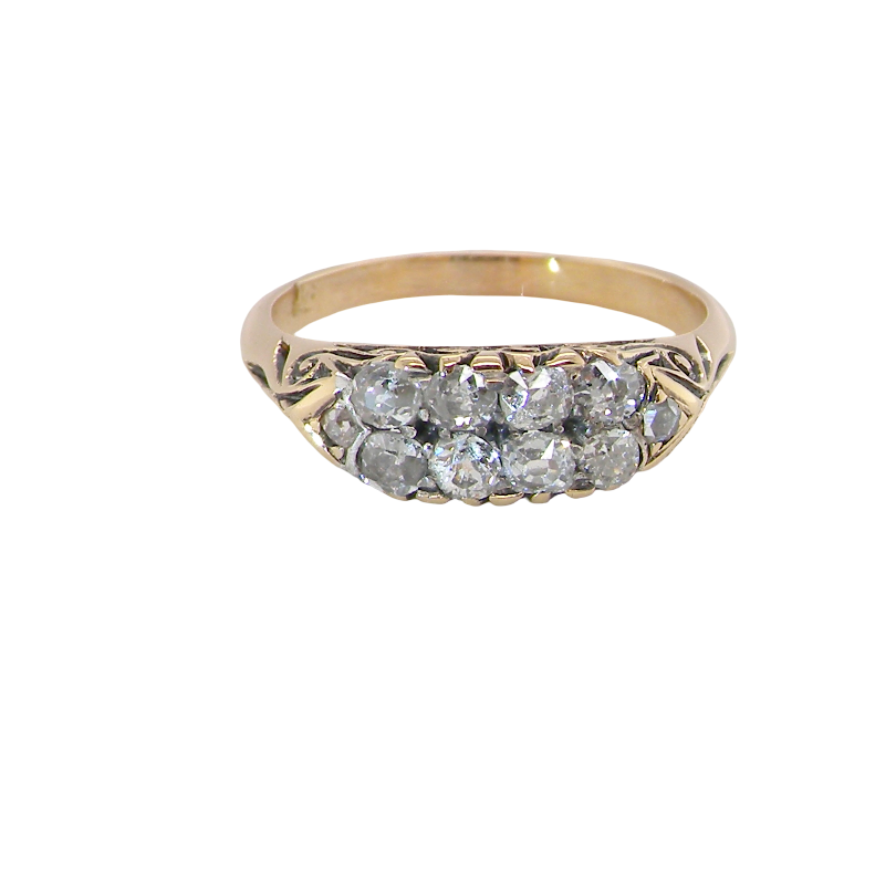 An eight stone boat shaped diamond ring, with two extra 'accent' diamonds to each end