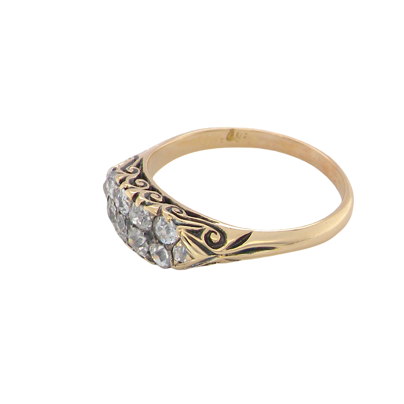 An eight stone boat shaped diamond ring, with two extra 'accent' diamonds to each end side