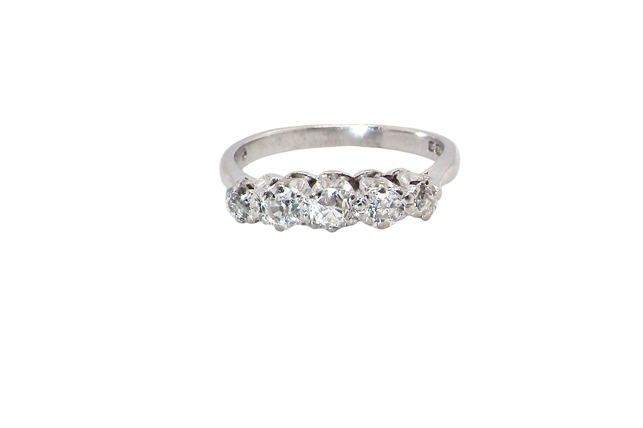 An elegant 18 carat white gold five-stone ring set with brilliant-cut white diamonds. The centre diamond measures 3.4mm, flanked by two 3.0mm stones and finished with 2.8mm diamonds at each end, creating a beautifully balanced graduated design.