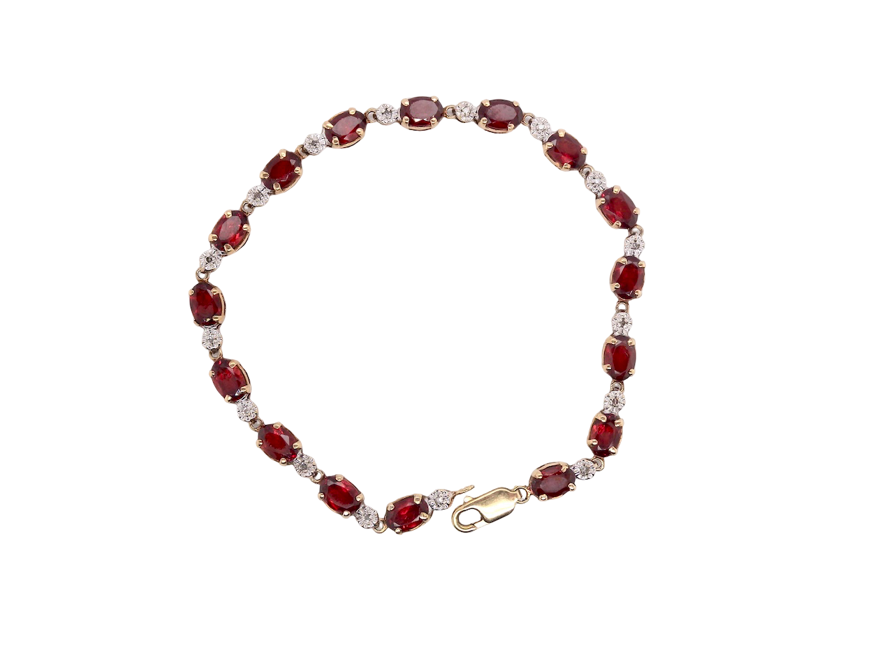 An elegant 9 carat gold bracelet set with sixteen rich red oval-cut garnets, each measuring approximately 6 x 4mm. Between each garnet sits a delicate illusion-set diamond in white gold, creating the appearance of larger stones while adding subtle sparkle. The total diamond weight is estimated at 0.15 carats.