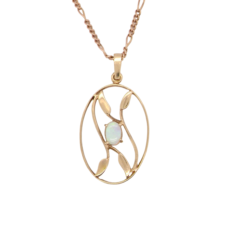 An elegant Art Deco style pendant featuring a beautiful oval opal measuring 6 × 4 mm,
