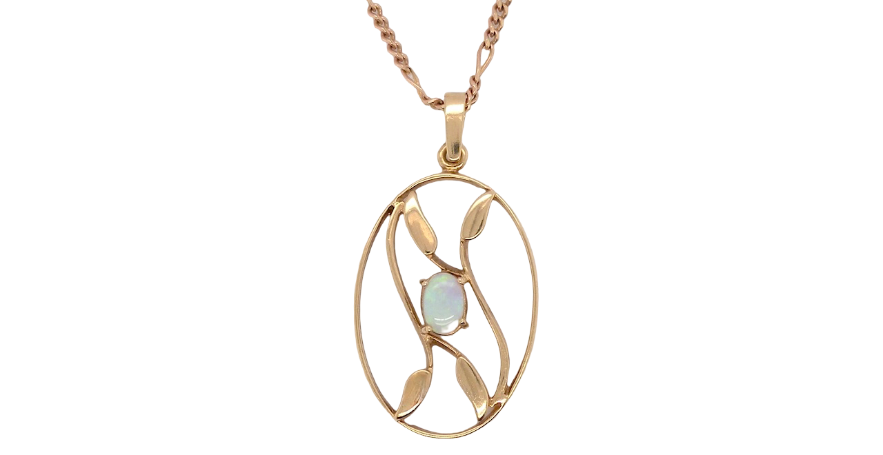 An elegant Art Deco style pendant featuring a beautiful oval opal measuring 6 × 4 mm, displaying a lovely play of colour.