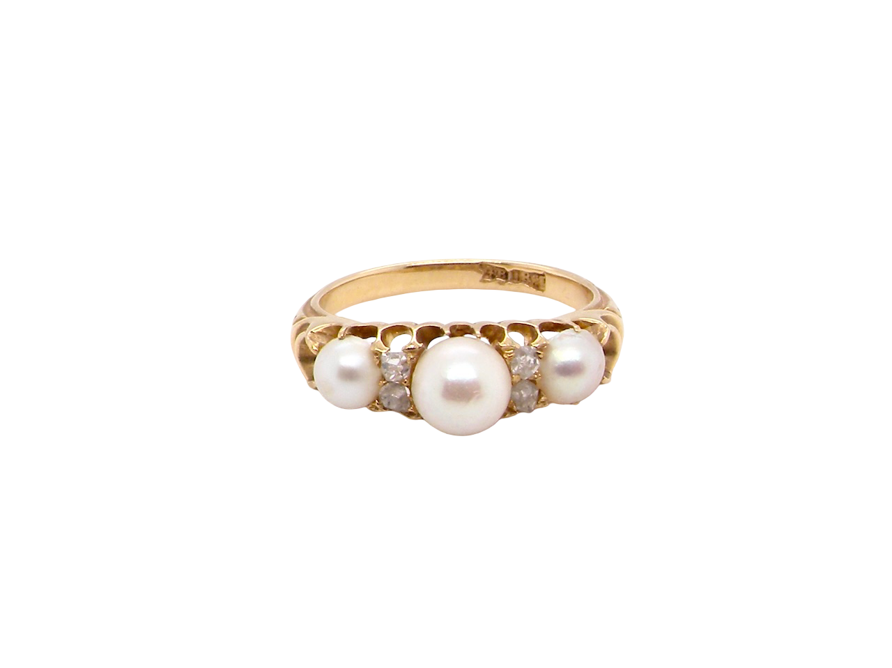 An elegant Victorian 18 carat gold* dress ring, set with three cultured pearls