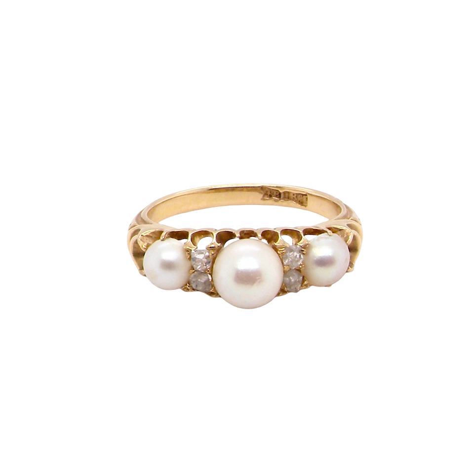 An elegant Victorian 18 carat gold* dress ring, set with three cultured pearls