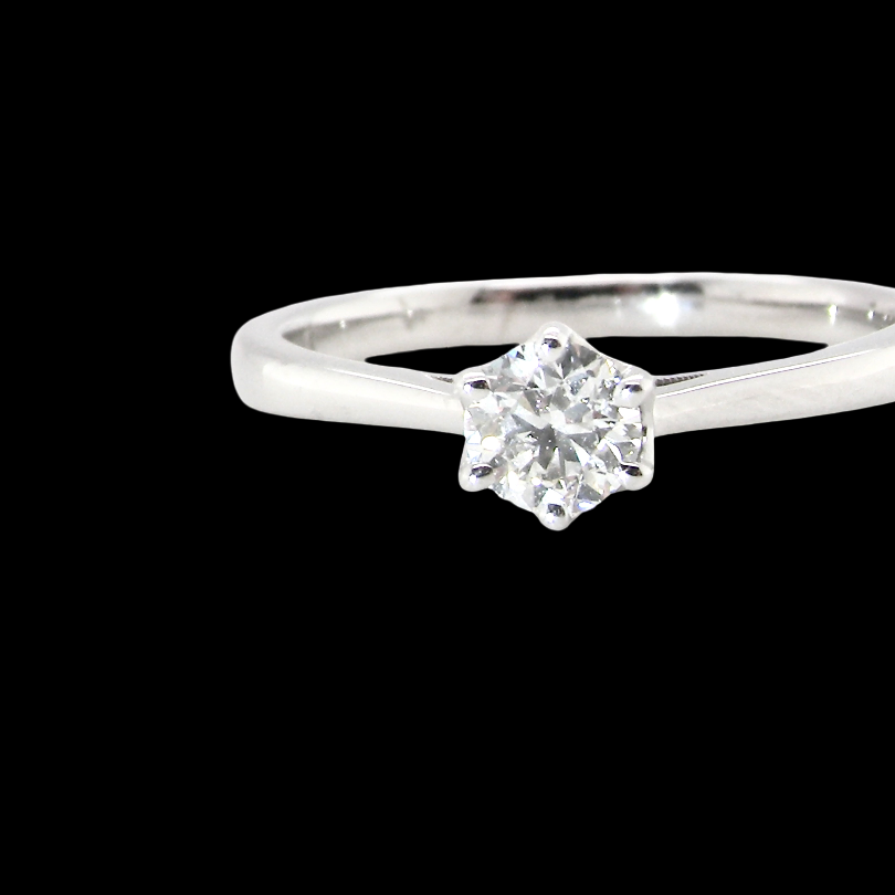 An elegant and timeless 18 carat white gold diamond solitaire ring, featuring a beautiful brilliant cut white diamond, independently certified by the Gemological Institute of America