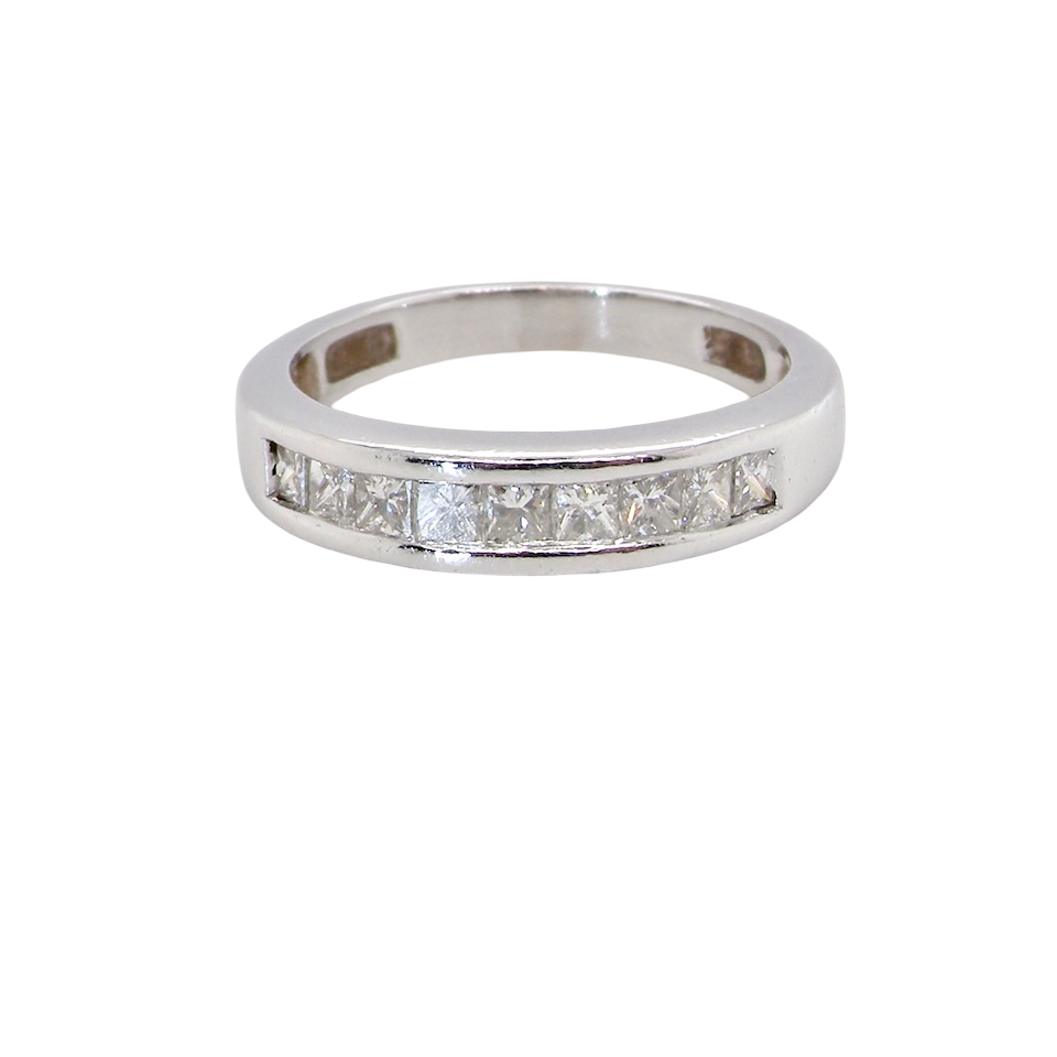 An elegant half-hoop eternity ring set with nine princess-cut white diamonds, each measuring approximately 2.5mm, with a total estimated diamond weight of 0.90 carats.