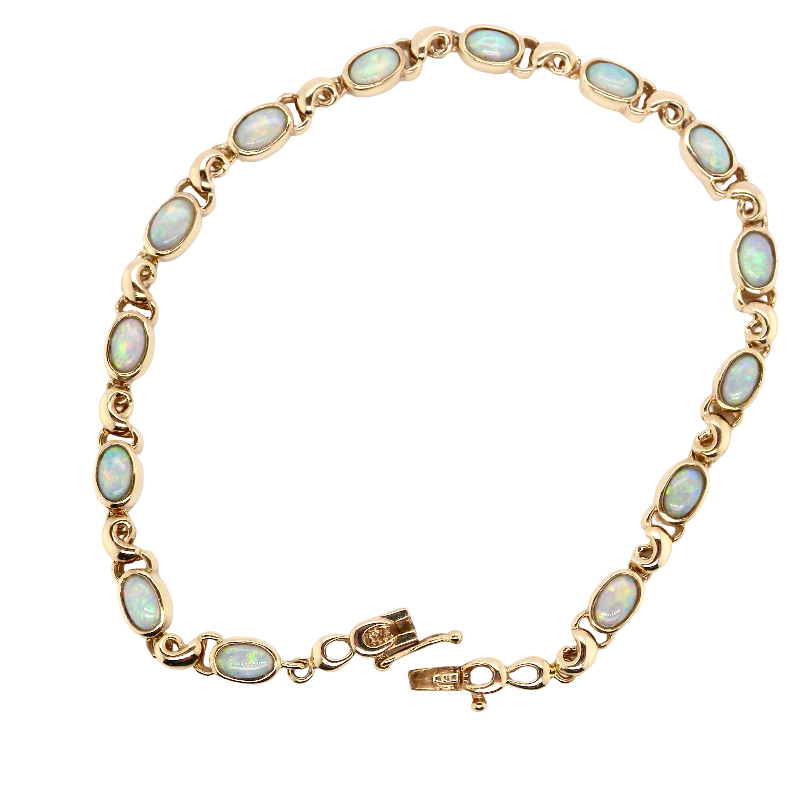 An elegant line bracelet set with fourteen oval opals, each measuring approximately 5 x 3 mm, displaying a pleasing and lively play of colour.