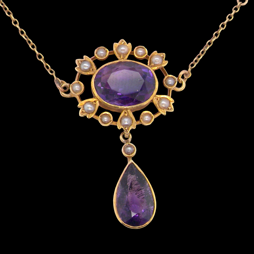 An elegant pendant from the late part of the 19th century. This Victorian pendant features luxurious amethyst gemstones,