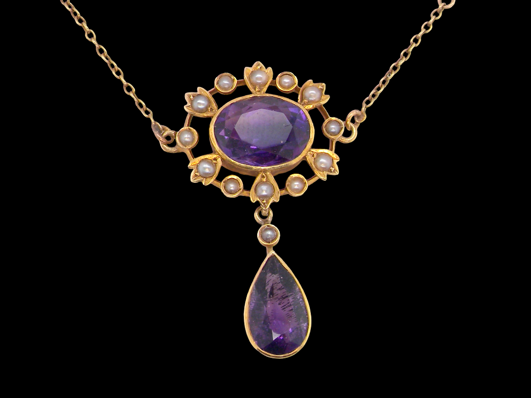 An elegant pendant from the late part of the 19th century. This Victorian pendant features luxurious amethyst gemstones,