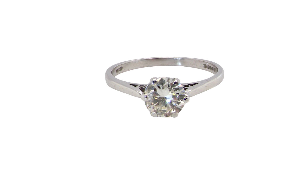An elegant single-stone solitaire ring set with an exceptional brilliant-cut white diamond, estimated at approximately 0.91 carats.