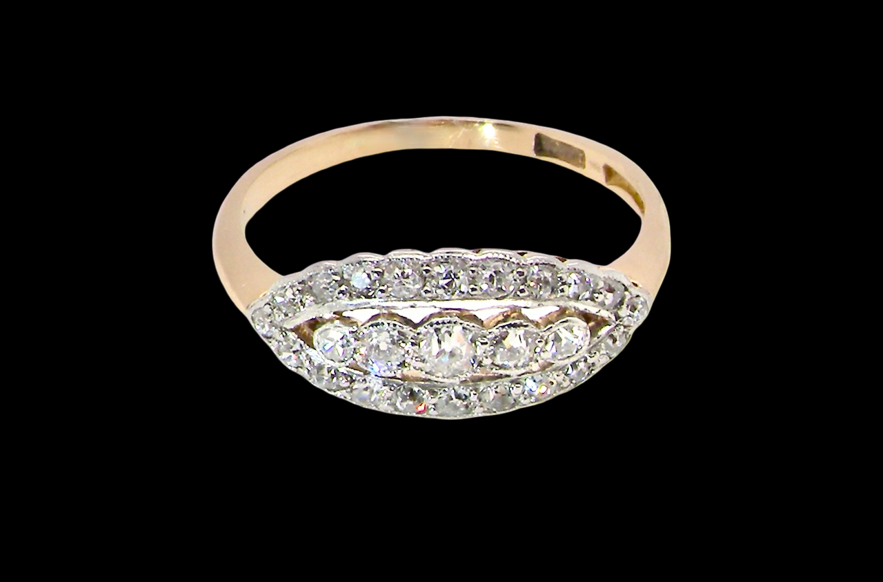 An enchanting diamond ring from the early part of the 20th century. above