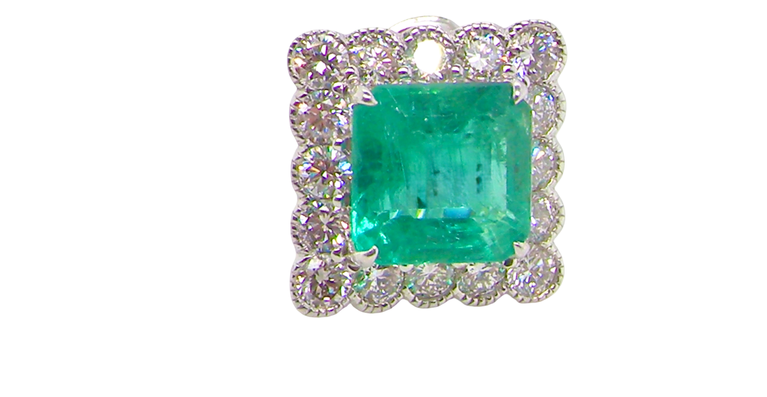 An exceptional pair of cluster earring Each of these beautiful earrings is set with a stunning square cut emerald, measures 7x7mm (est carat size 1.8 carats) excellent colour and clarity with just a few inclusions.