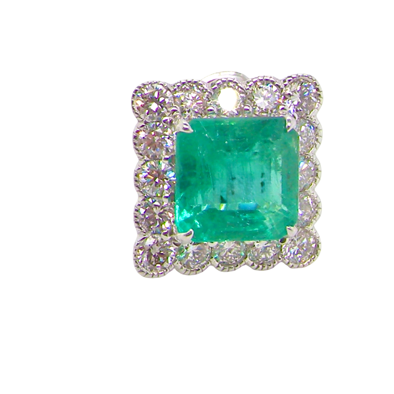 An exceptional pair of cluster earring Each of these beautiful earrings is set with a stunning square cut emerald, measures 7x7mm (est carat size 1.8 carats) excellent colour and clarity with just a few inclusions.
