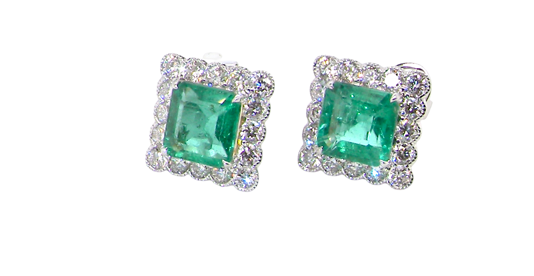 An exceptional pair of cluster earrings. Each of these beautiful earrings is set with a stunning square cut emerald, measures 7x7mm (est carat size 1.8 carats) excellent colour and clarity with just a few inclusions.