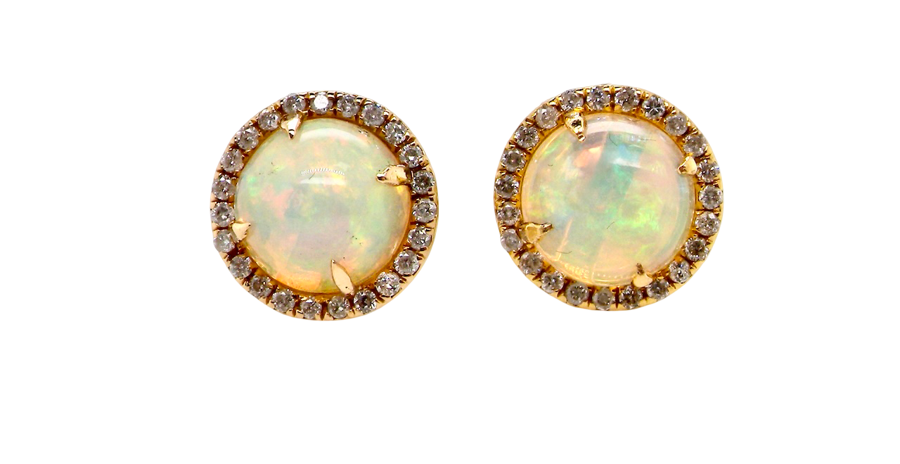 An exquisite pair of opal and diamond earrings