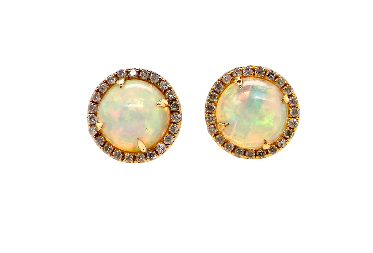 An exquisite pair of opal and diamond earrings