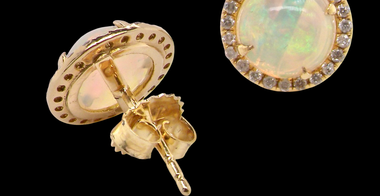 An exquisite pair of opal and diamond earrings