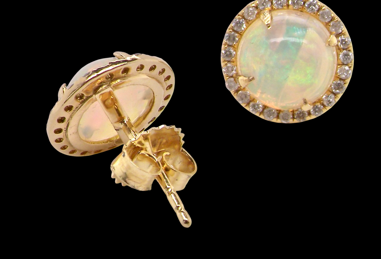 An exquisite pair of opal and diamond earrings