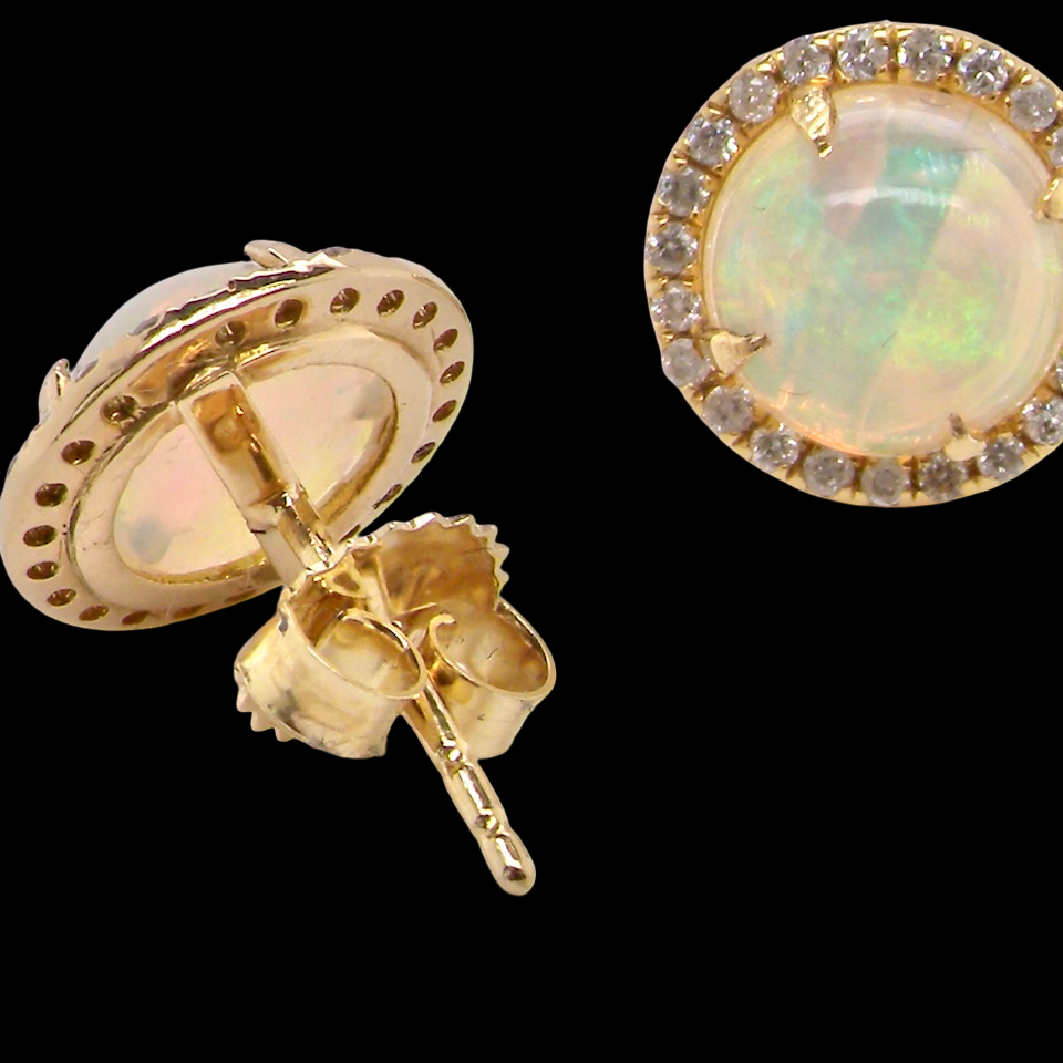 An exquisite pair of opal and diamond earrings