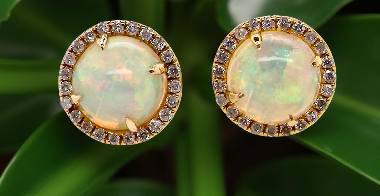 An exquisite pair of opal and diamond earrings