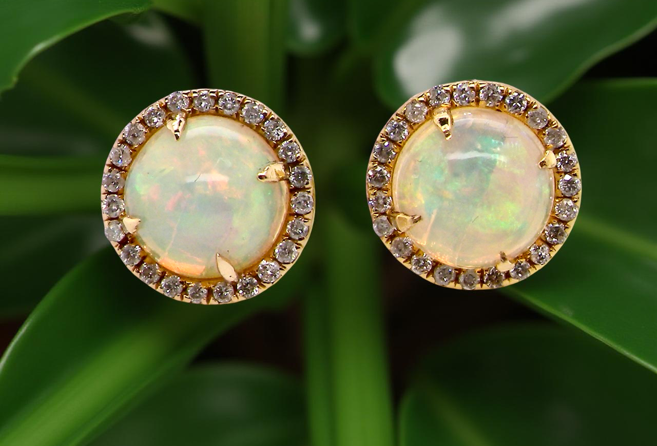 An exquisite pair of opal and diamond earrings